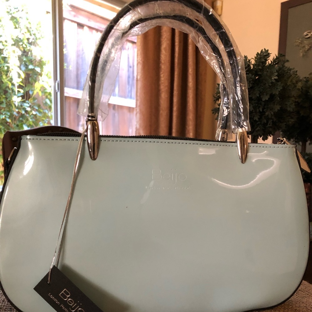 Light blue Patton Leather Beijo Bag.